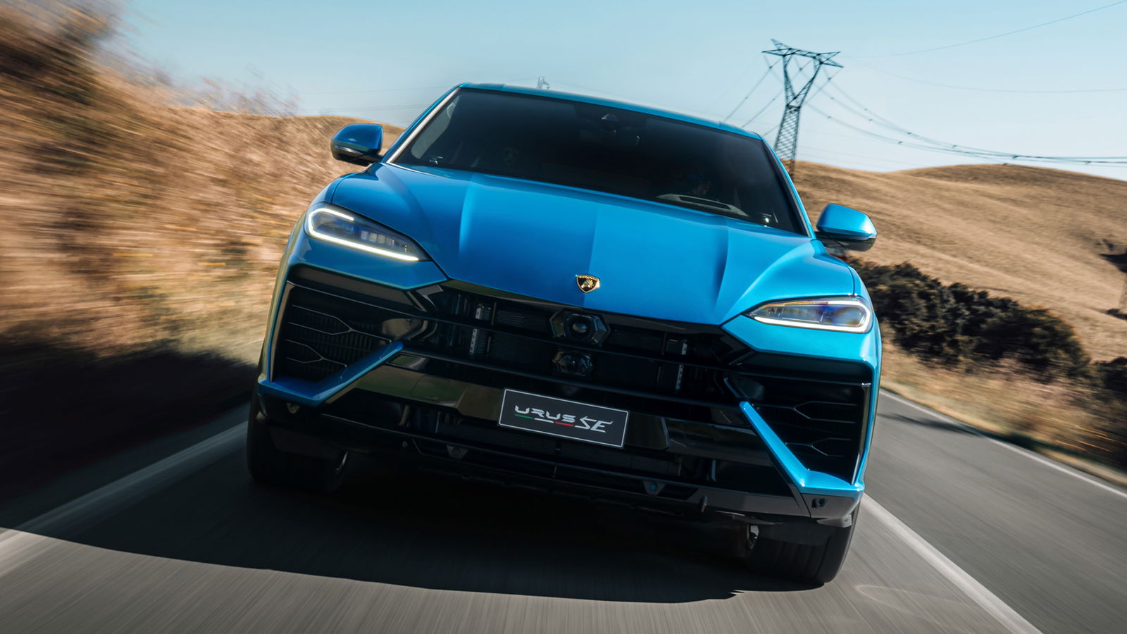 Lamborghini Urus SE, front, driving